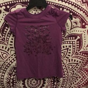 A very nice purple soft tee shirt for sporty look.